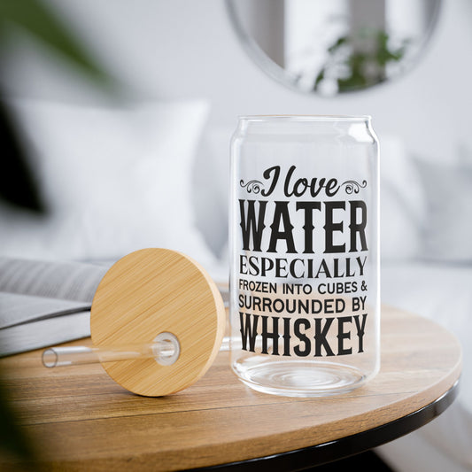 Glass with humorous text on a wooden table