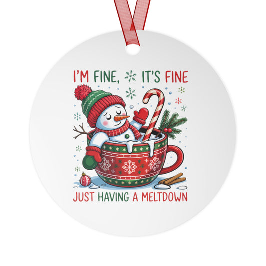 Circular Christmas ornament with a snowman in a mug, candy canes, and text on a white background.